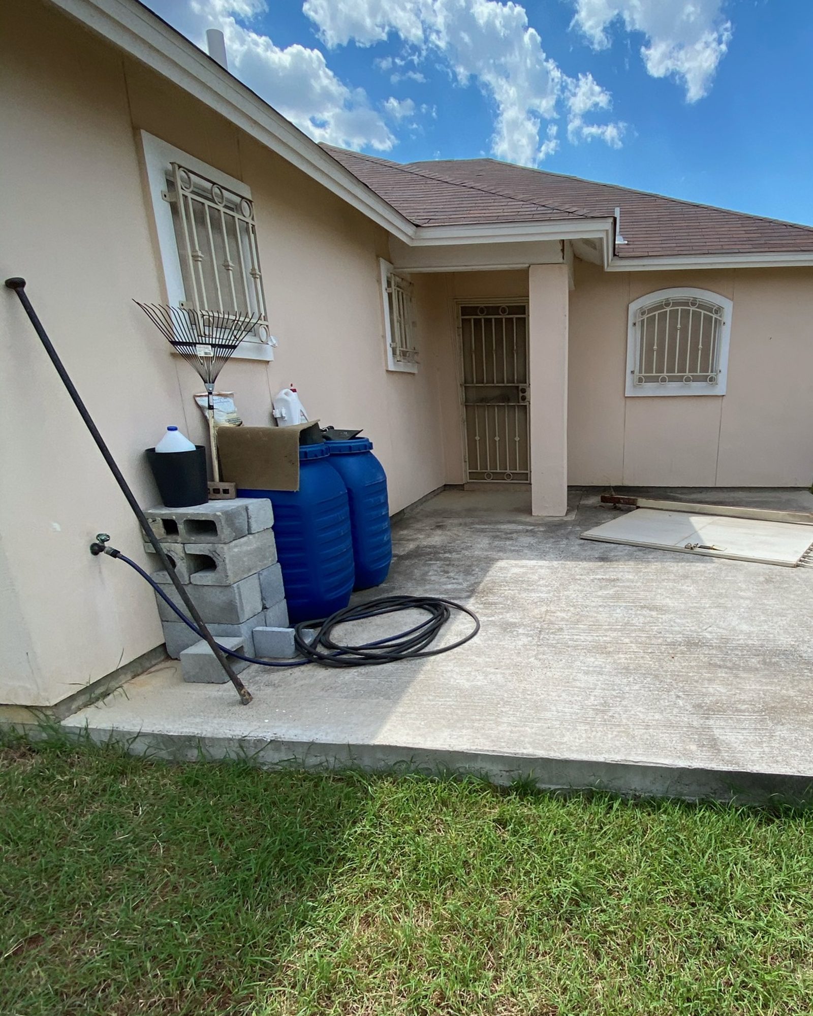 Before: the open back patio